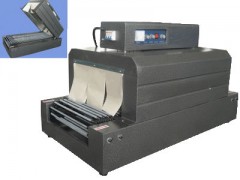 山东餐具包装机Ω东营消毒餐具热收缩包装机图1