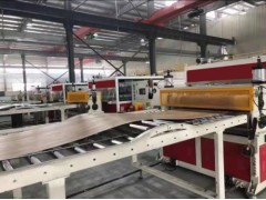 江苏无锡LVT地板卷材自粘生产线机械设备图1